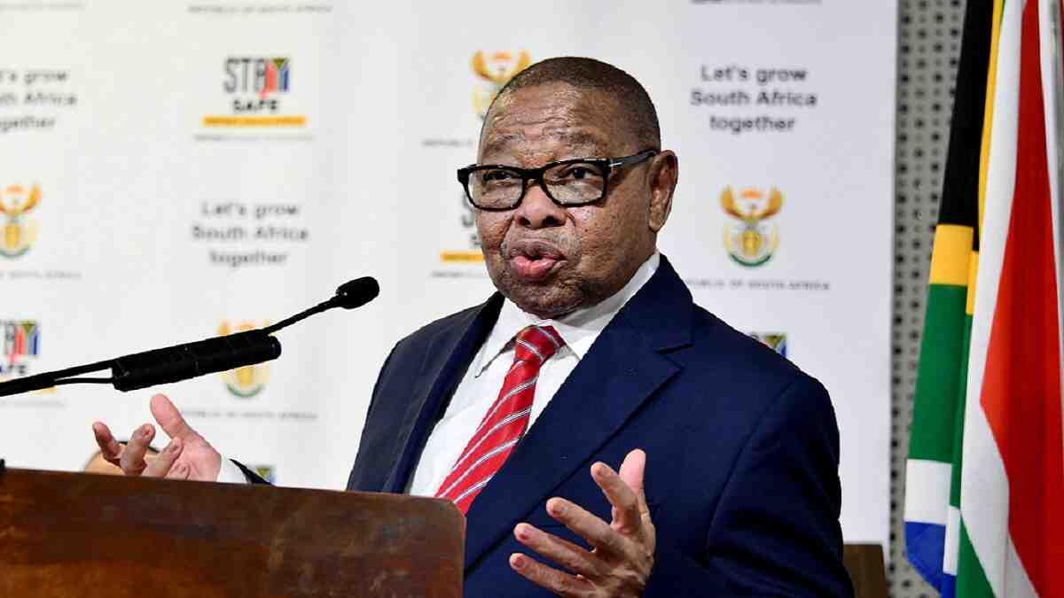 Minister explaining why universities will be investigated
