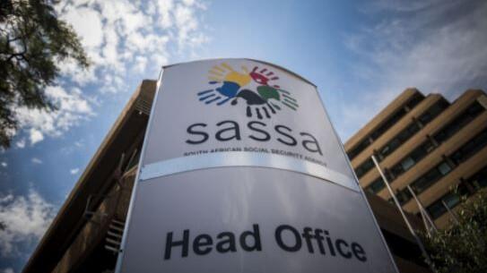 SASSA Head Office standing board placed outside of a building