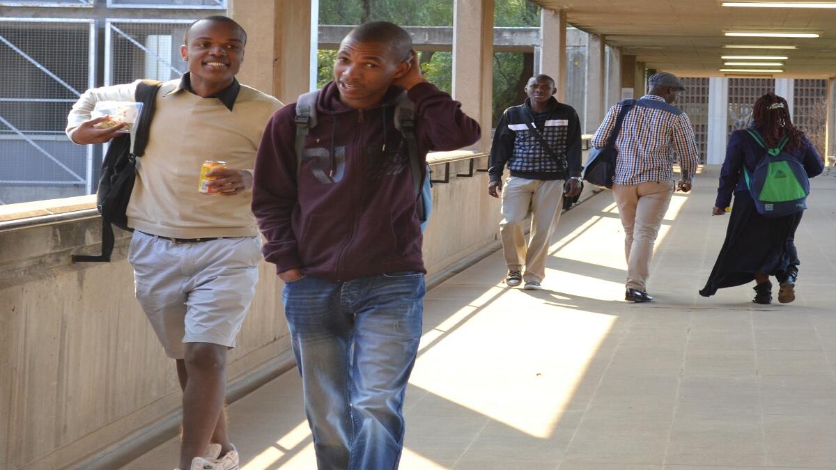 Students walking in corridor