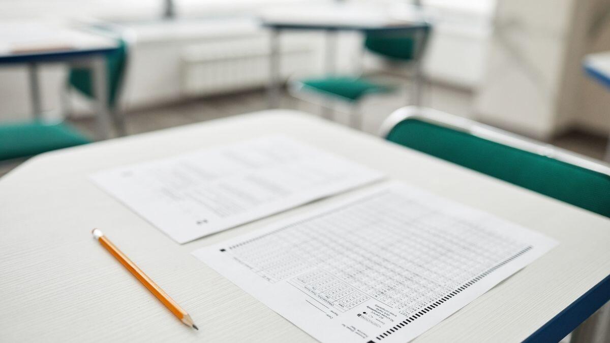 exam paper and pencil on a desk