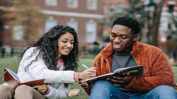 Young people accessing online learnings using laptops